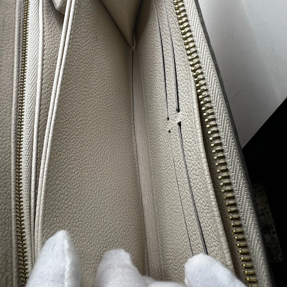 GUC Louis Vuitton Monogram Cream Empreinte Zippy Wallet - Picture 7 of 11